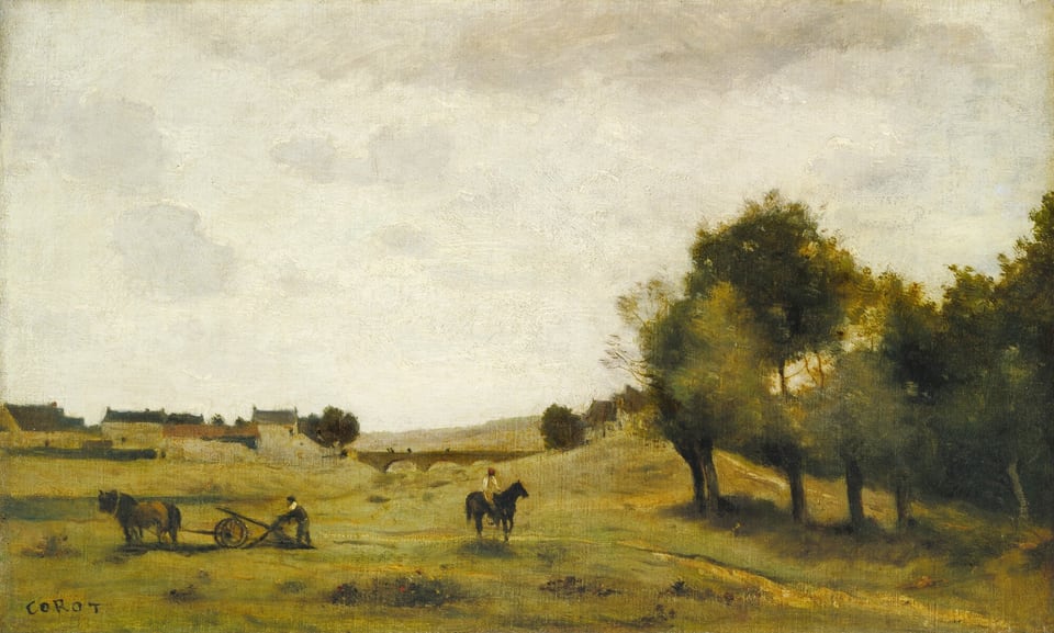 A person at the center of this loosely painted horizontal landscape rides a dark horse across a field as a man to the left works the field behind a horse-drawn plow. The field is carpeted with muted and gold-shaded green, and a grove of trees in the right third of the composition are painted in fern, olive, and dark green. A patch of darker green near us and to left of center is dotted with red and yellow to suggest flowers. The men and horses are small in relation to the composition. The people have brown skin and are painted with a few strokes in dark gray and muted green for the man behind the plow to the left and pale yellow and white and a red cap for the person on horseback. A band of houses with tan or light yellow walls and gray or terracotta red roofs line the far side of the field to the left, and an arched bridge crosses what appears to be a shallow, grassy ravine near the center. The horizon comes about a third of the way up this composition and a few smoke-gray clouds line the upper edge of the otherwise milk-white sky. The artist signed the lower left corner, “COROT.”