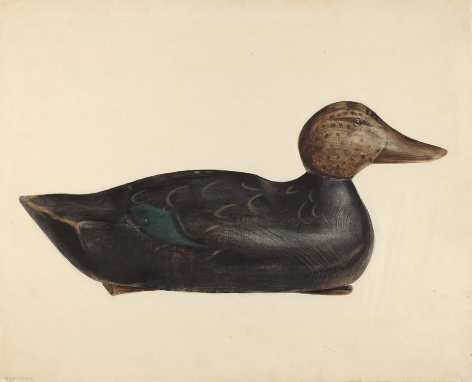 The image shows a wooden duck decoy against a plain, light-colored background. The duck is crafted in various shades of brown, black, and green with subtle highlights in lighter tones. The duck is facing to the right side of the frame, with its head slightly tilted upward.