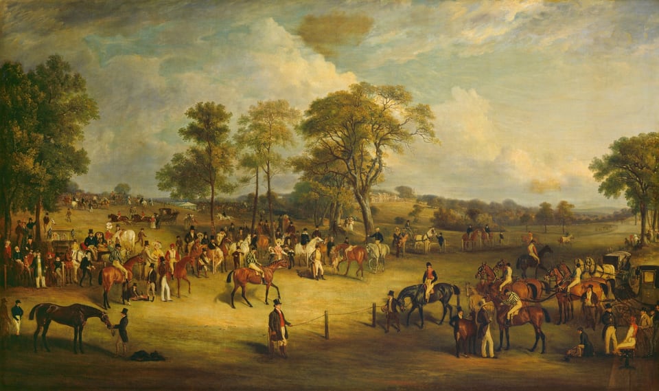 The painting depicts an equestrian scene with people and horses in a green landscape. There are several people on horseback, and others standing by horses. Some people are also sitting in horse-drawn carriages. The horses are in a variety of colors, and the people wear formal clothing like suit jackets, top hats, vests, or colorful dresses. People fill the middle of the scene and the green hills that rise to the left, while a wide path is marked off on the right, bordered by fences. There are some tall trees around the area, with people gathering below them. In the distance, a large white building with columns and blue roofs can be seen. There is also a white tent partially behind a hill on the left. The sky above is blue and filled with white and gray clouds.