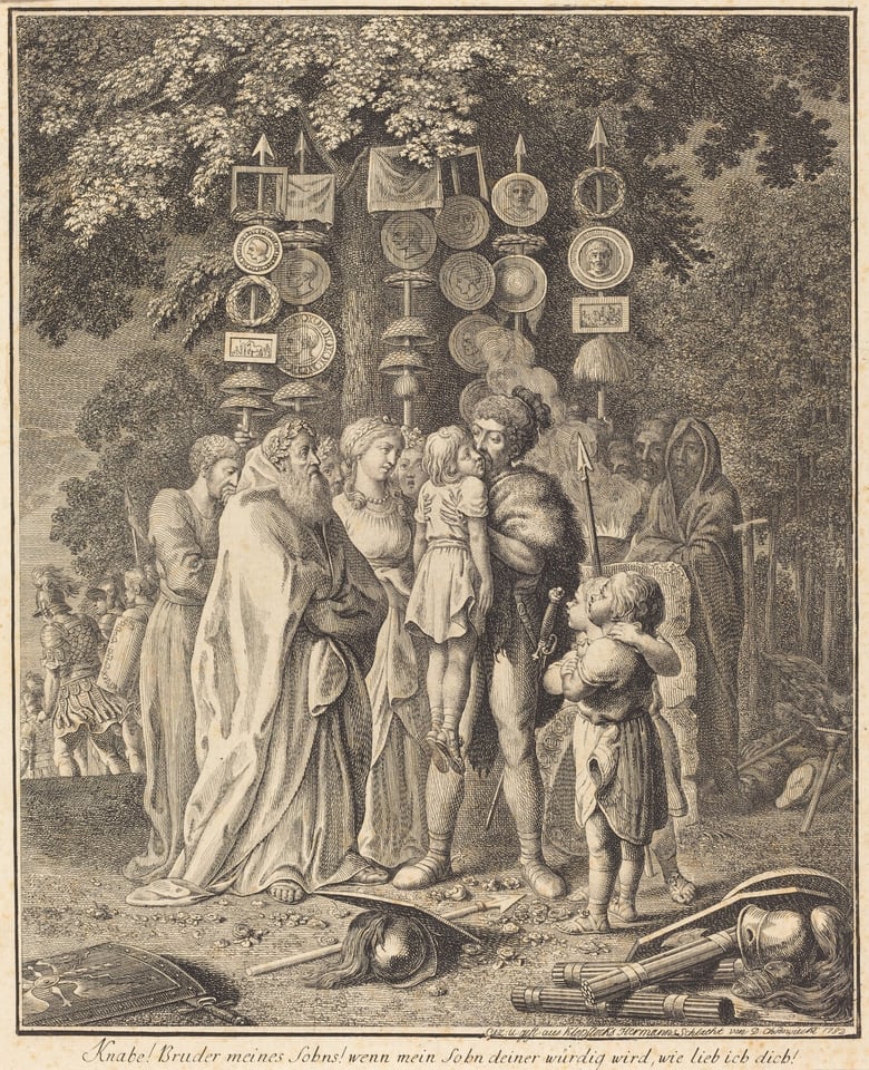 The image depicts a group of people in varying poses and outfits. A central figure, possibly a child, is being held up by a man. Those around them are positioned differently, some standing closely. The figures have detailed faces and wear garments resembling classical attire. Shields and banners decorated with symbols are present in the background. Armor and helmets are scattered on the ground. Trees and a group of people in the distance are part of the background.