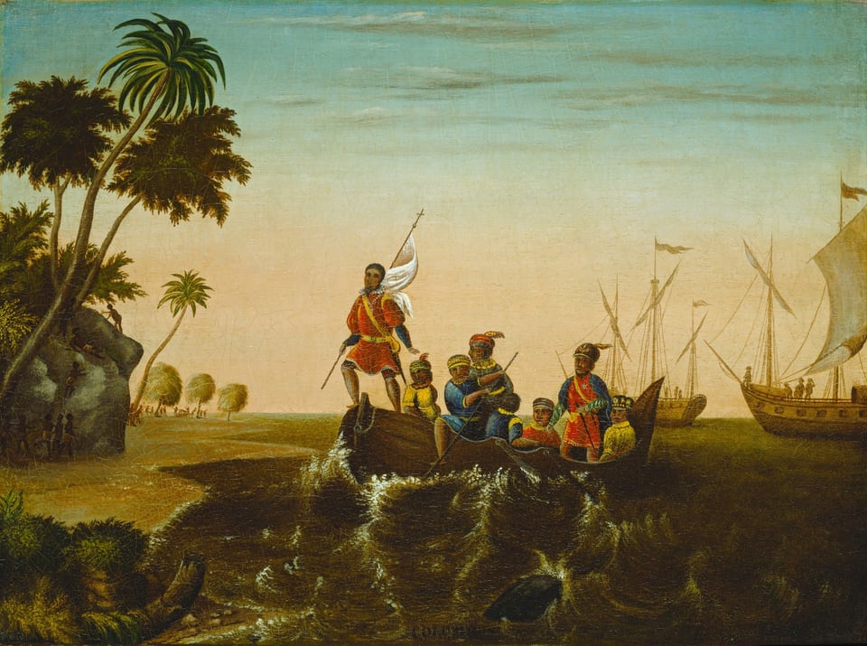 The painting features a scene showing men in a boat landing on a shore. The horizon is low, with larger sailing ships seen in the distance on the right, floating on the dark green water. The central boat has around eight men in it, all with tan skin and dark hair, dressed in bright garments in shades of red, blue, and gold. Many of them wear plumed helmets and have jewelry or badges adorning them. The boat is heading towards land on the left, and one man stands at the front of the boat, holding a white flag. The land on the left is green, with tall palm trees and a rocky gray mountain. People with dark skin can be seen in on the land in the distance, some climbing the mountain and others standing beneath trees. The sky is a gradient from pinkish-orange near the horizon to light blue at the top of the painting, with a few faint gray clouds.