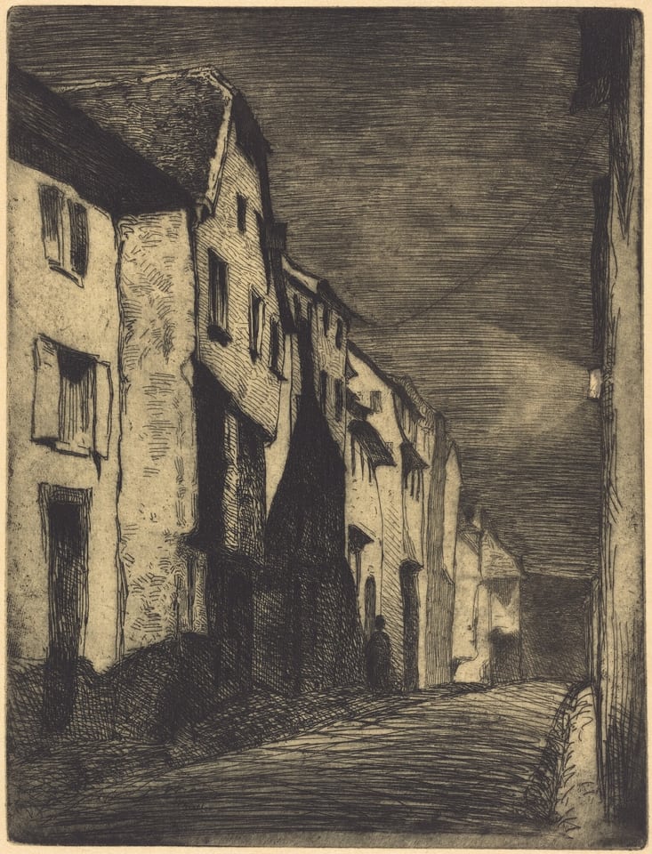 The image shows a street scene from a close perspective down a narrow alleyway. The horizon is not visible, with buildings on both sides. The style features detailed etching with fine lines and shading for depth and texture. The color palette is monochromatic with black, gray, and off-white tones. The houses have worn facades, and there is a distant figure. The sky is dark and overcast, enhancing the shadow-filled scene.