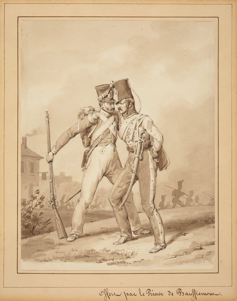 The image features two men in military uniform engaging closely with each other. Both are shown from head to toe. The man on the left stands with his left leg forward, holding a rifle, and has his right arm around the shoulder of the other man. The man on the right has his right leg slightly bent, supporting his weight, and is holding a sword in his left hand. Each man has distinctive facial features. Both wear tall, elaborate military hats and detailed uniforms. The man on the left displays a strap over his shoulder, while the man on the right has intricate decorations on his jacket and trousers. In the background, there are a few more soldiers and part of a building to the left. The setting is monochromatic.